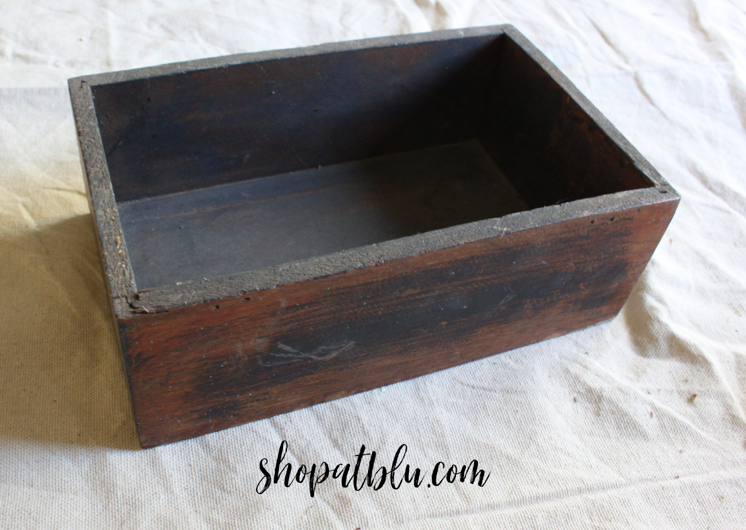 The Blue Building Antiques Shopatblu Table Risers from a wooden box